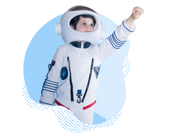 smiling child in space suit raising fist into the air